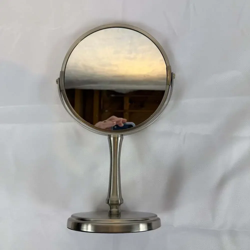 Dual-sided magnifying vanity mirror 12” Tall Chrome/silver Finish Round Base